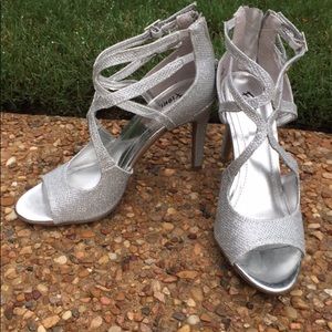 Silver/grey  high heel ankle strap.